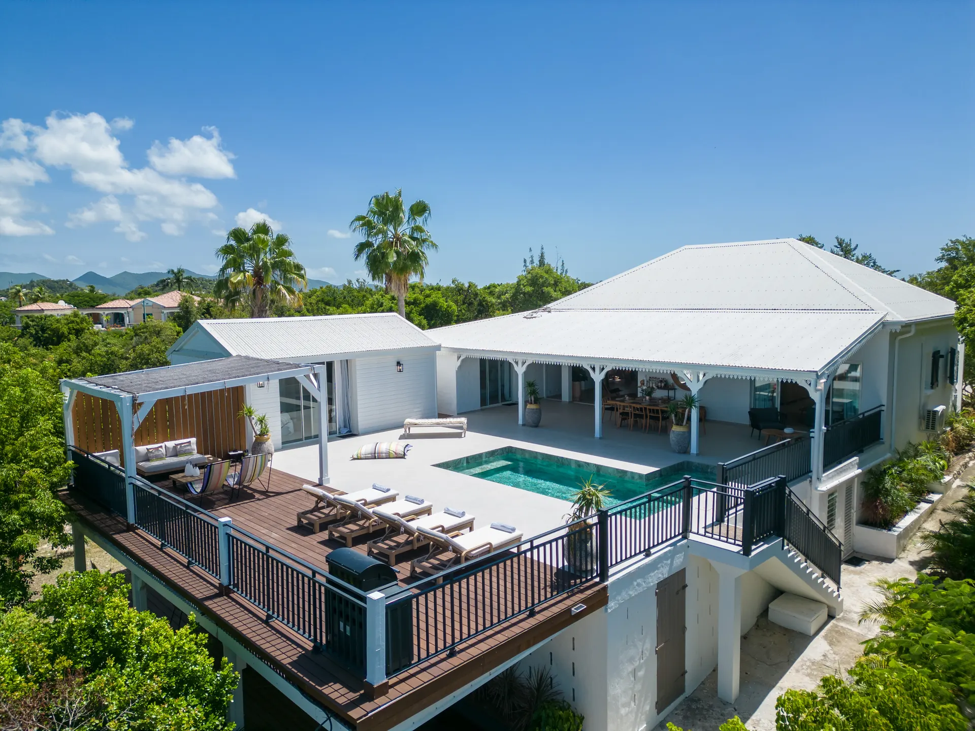 Aerial view of Villa Les Oliviers with its private pool and veranda in Les Terres Basses, St. Martin